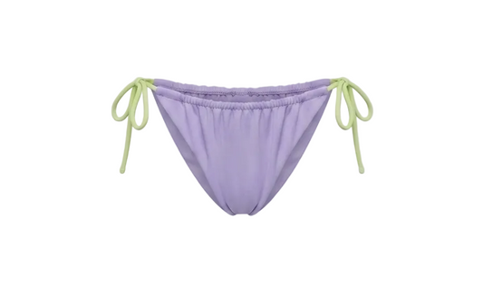 Minimalist Amalfi Dream Bikini by ÁMBER DEL MAR in lilac with lime green side-ties that is preppy and coastal chic aesthetic summer swimwear.