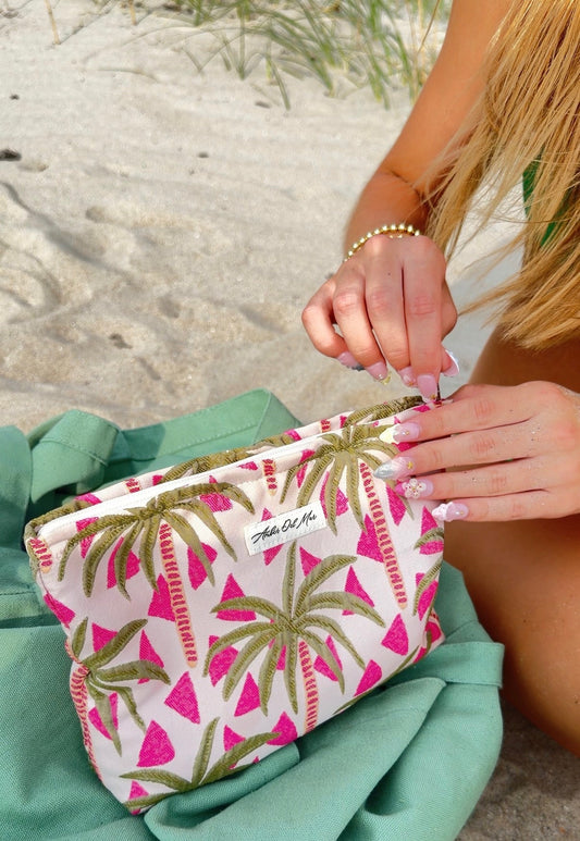 100% cotton canvas pouch with embroidered green palm trees and pink trim by Ámber Del Mar.